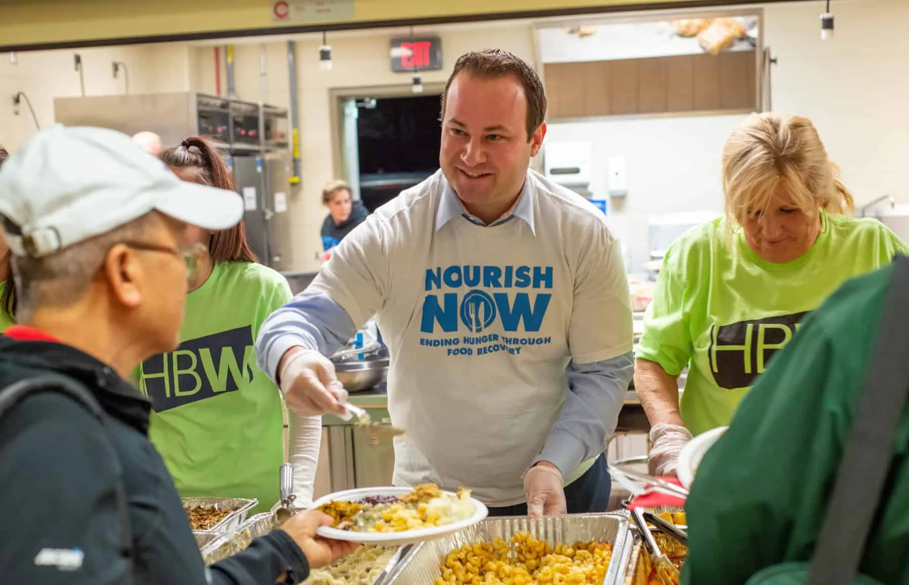 Volunteers Serving Food Volunteers Serving Food