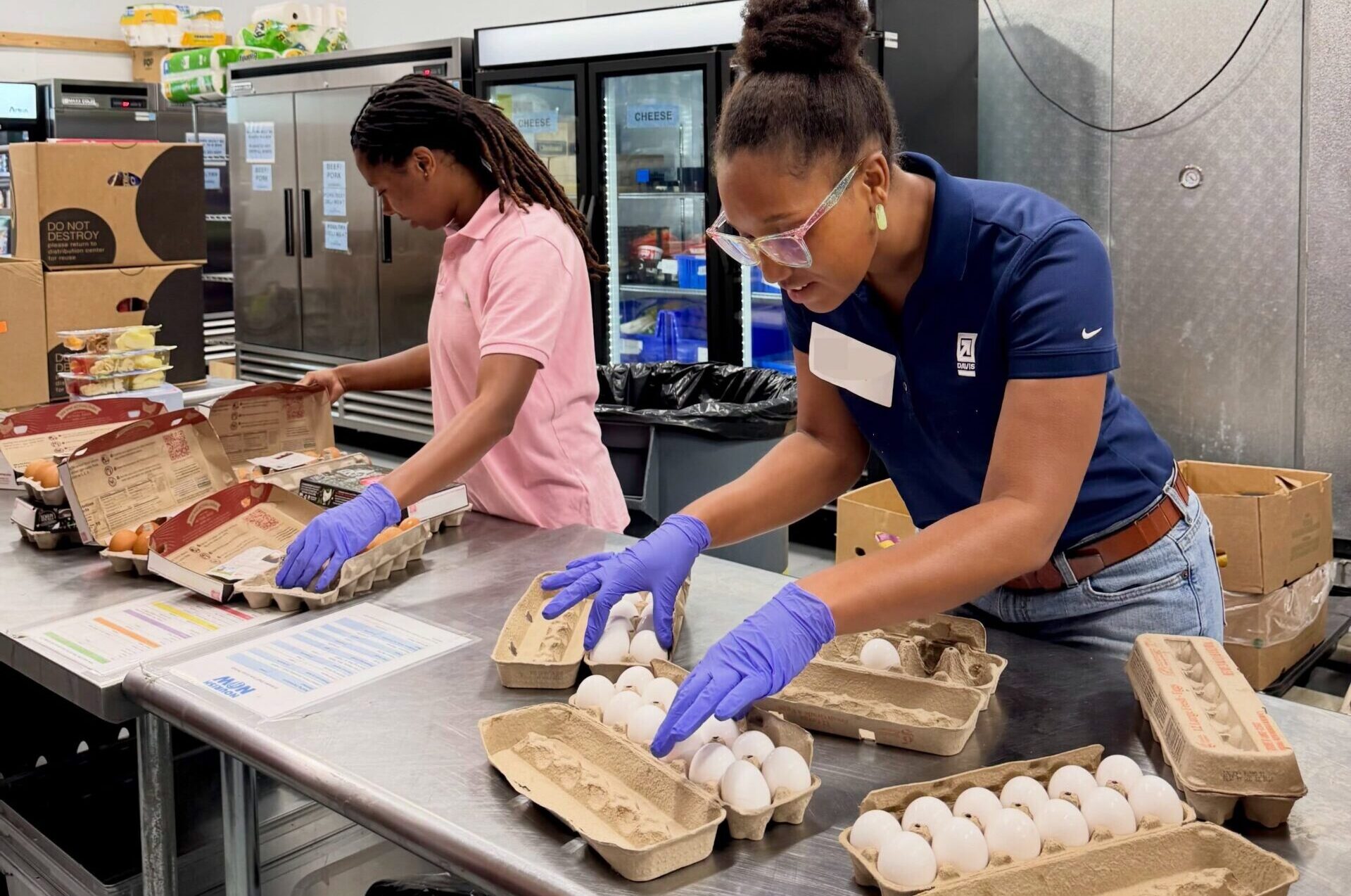 Volunteers sorting eggs